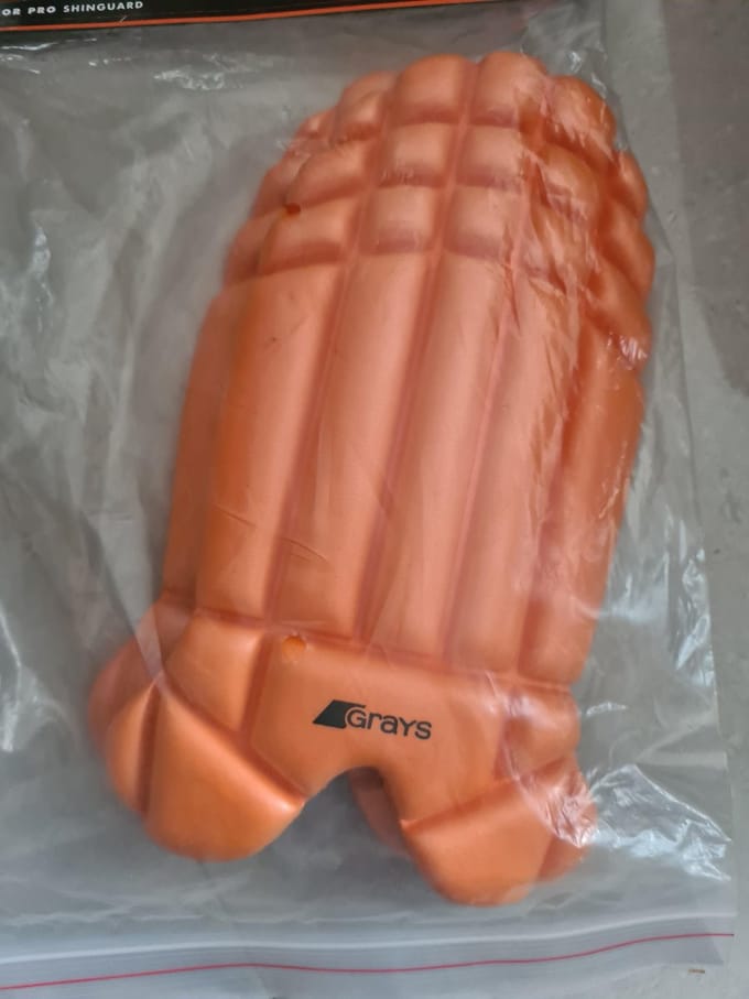 Grays hockey shinguard oranje junior