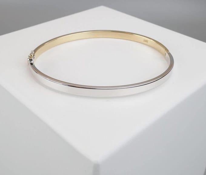 Gouden bicolor Christian bangle
