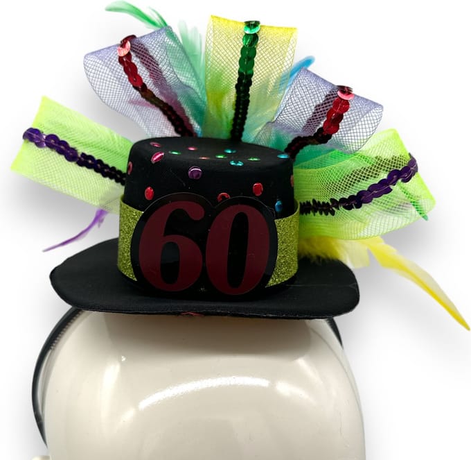 Leuke Haarband Met Hoedje 60 Jaar Oud.