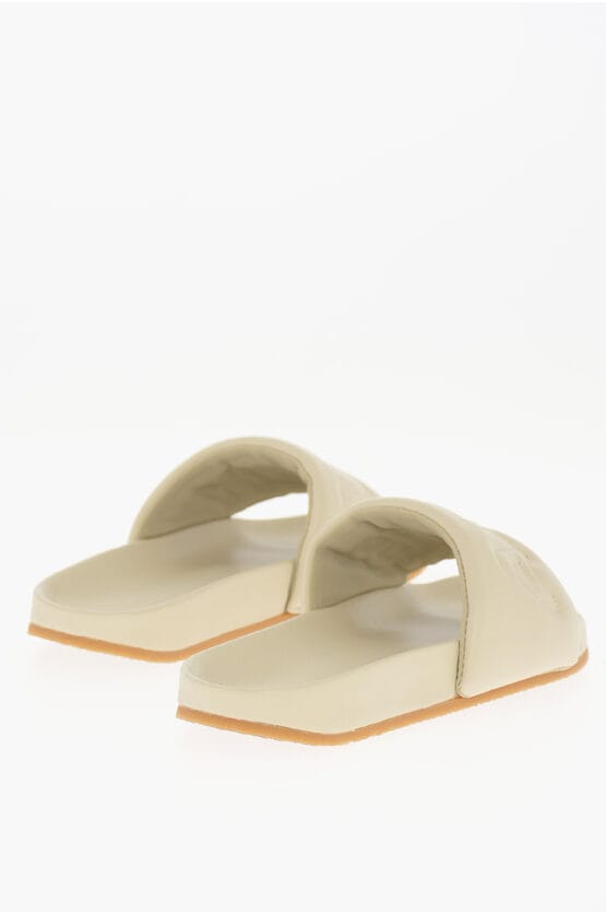 Effen leren slippers in beige