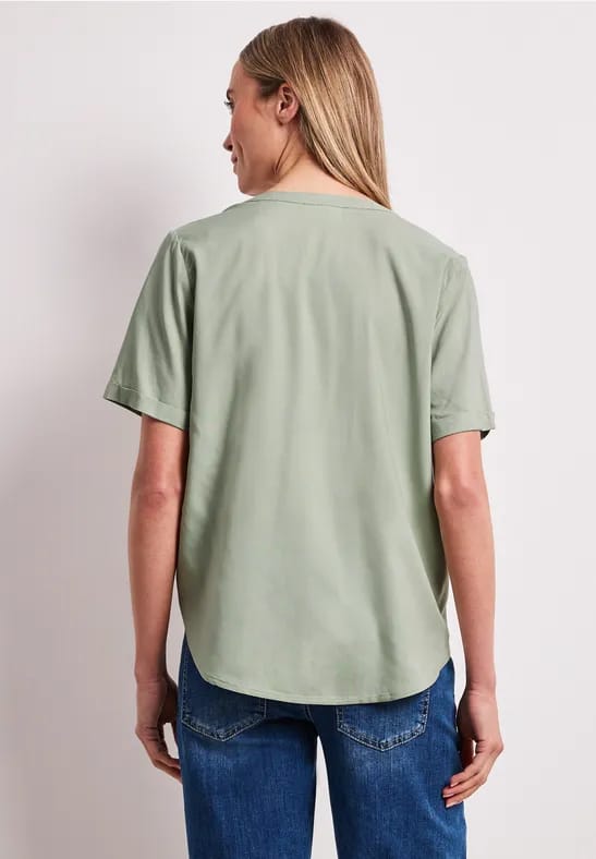 Blouse met gespleten hals en omslag