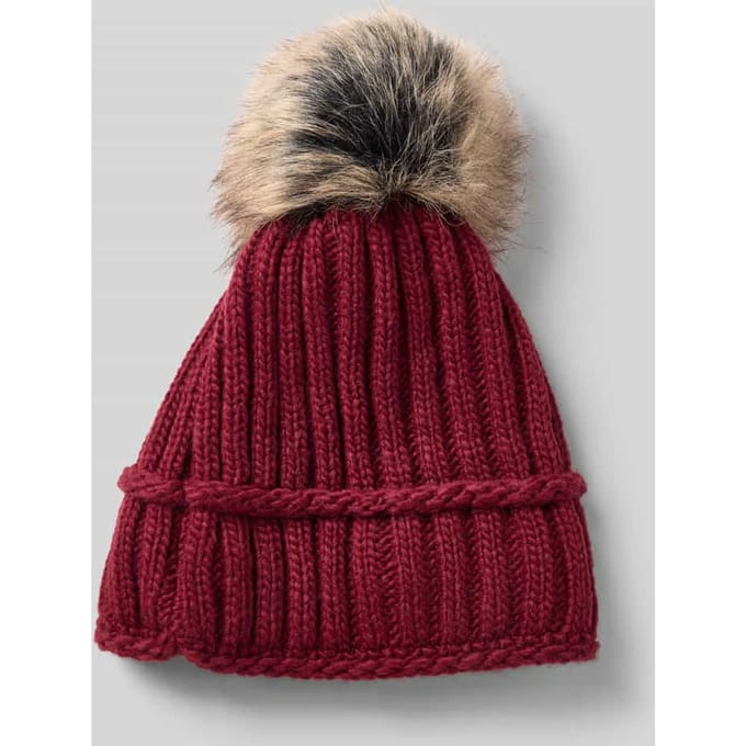 Gebreide muts met wol en pompon