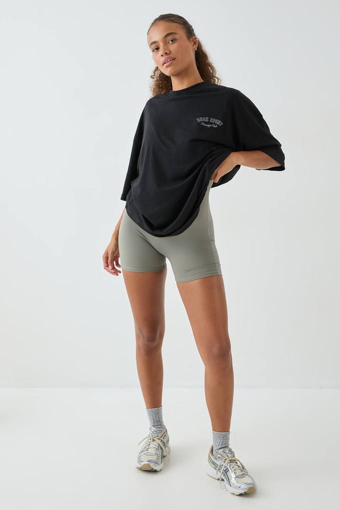Dames DSGN Studio Sport Training Club Oversized T-Shirt | Zwart | Maat: 2XL