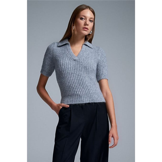 Vrouwen Aansluitende Geribbelde Polo Sweater