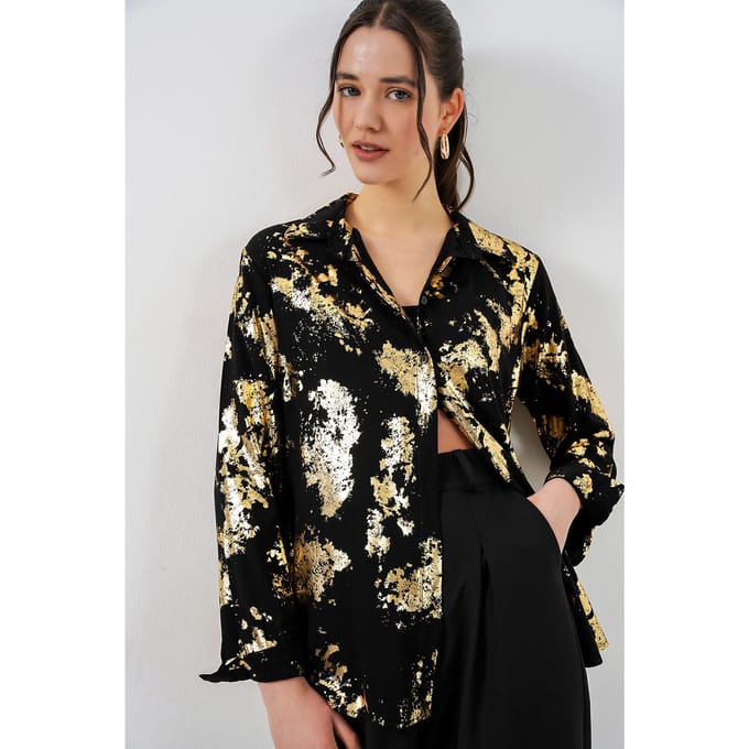 Oversized gestreepte blouse met knopen