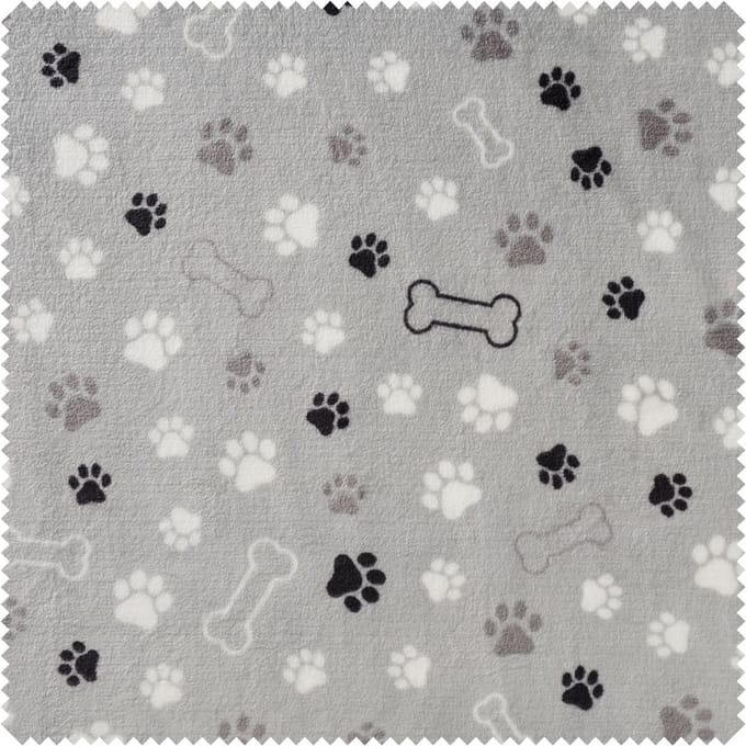 Fleece stof "Paws and bones"