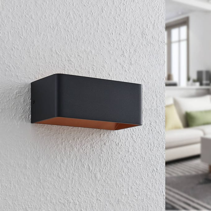 Arcchio LED wandlamp Karam, 20 cm, zwart, metaal, omhoog/omlaag