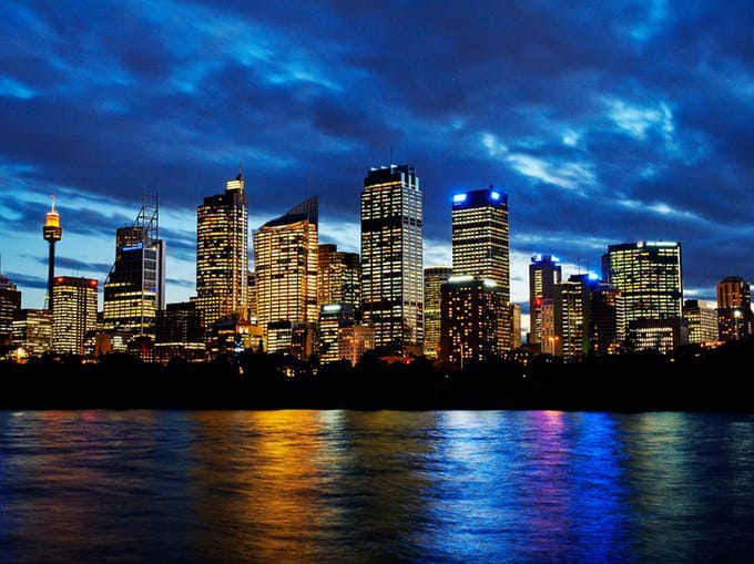 Fotobehang - Avond wolken boven Sydney.