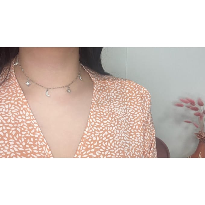 Ketting met sterretjes en maantjes | zilver gekleurd