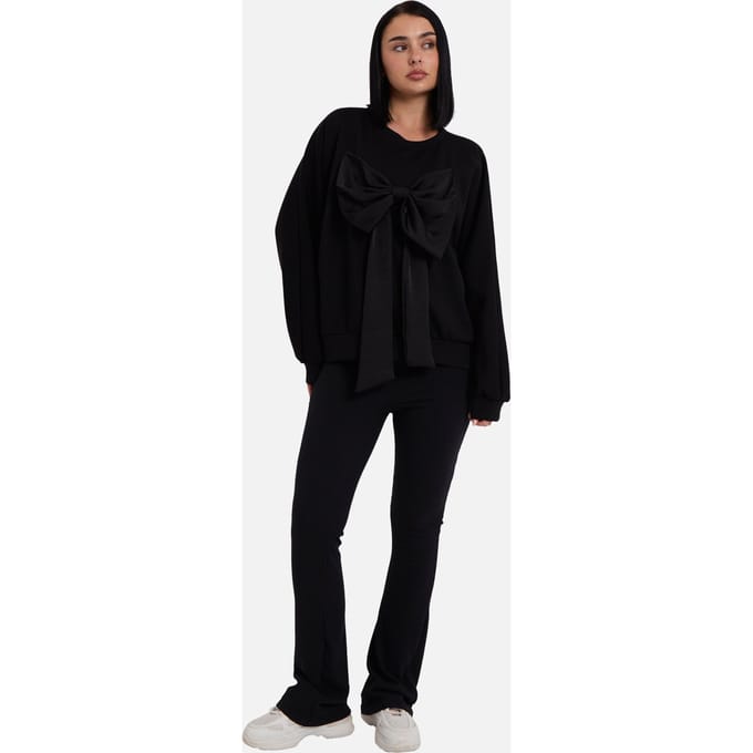 Zwarte oversized trui met strik aan de voorkant