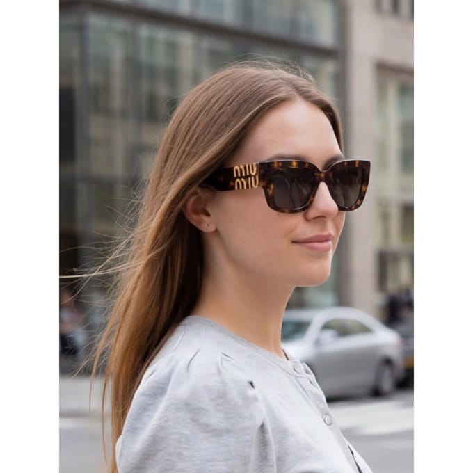 Lunettes de soleil pour femme Miu Miu SMUB05 marron