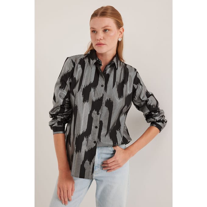 Oversized gestreepte blouse met knopen