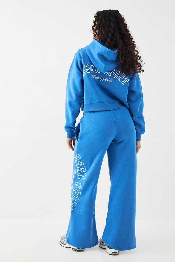 Dames DSGN Studio Sport Training Club Rechte Pijp Joggingbroek | Blauw | Maat: 2XL