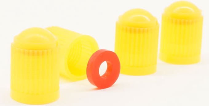 Schrader (auto) ventiel - Geel kunststof met rubberen ring ventieldoppen