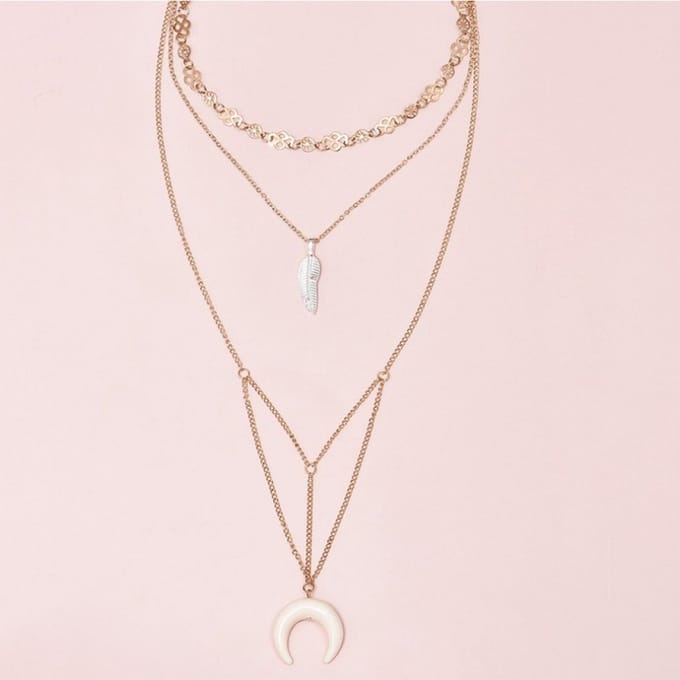 Fijne delicate ketting met halve maan en veer – 4-delig – Goudkleur