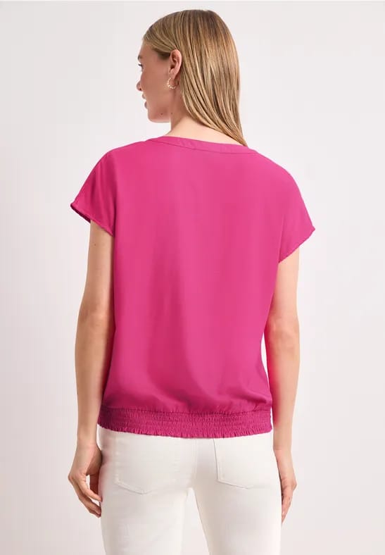 Blouseshirt met gespleten hals en smokdetail
