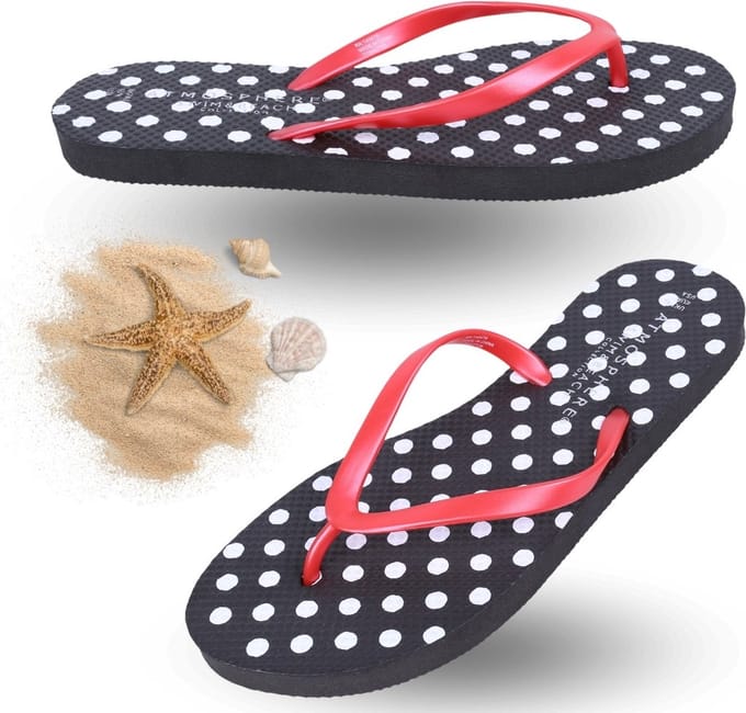 Zwarte teenslippers met stippen