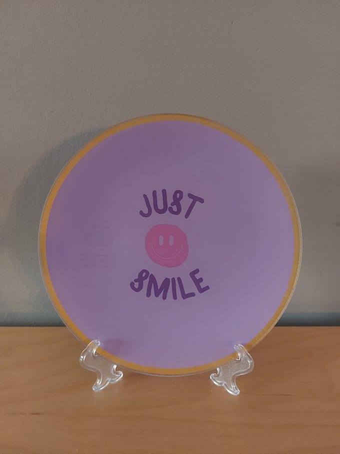 leuk bordje met de tekst : just smile