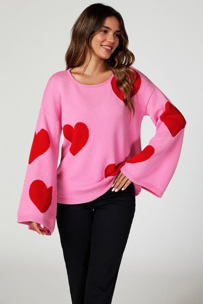 Oversized rode trui met wijde mouwen en roze hart
