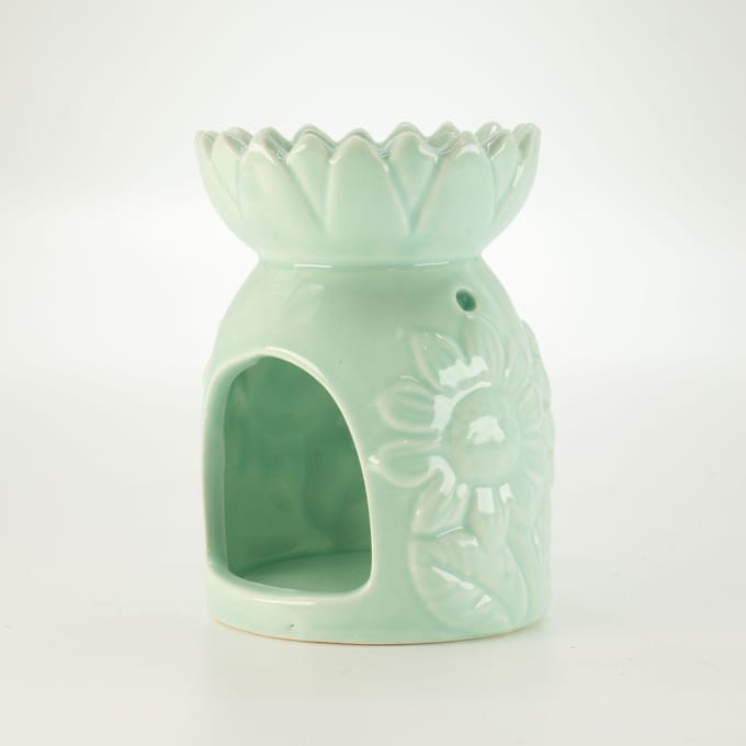 Keramische zonnebloemoliebrander - pastelgroen
