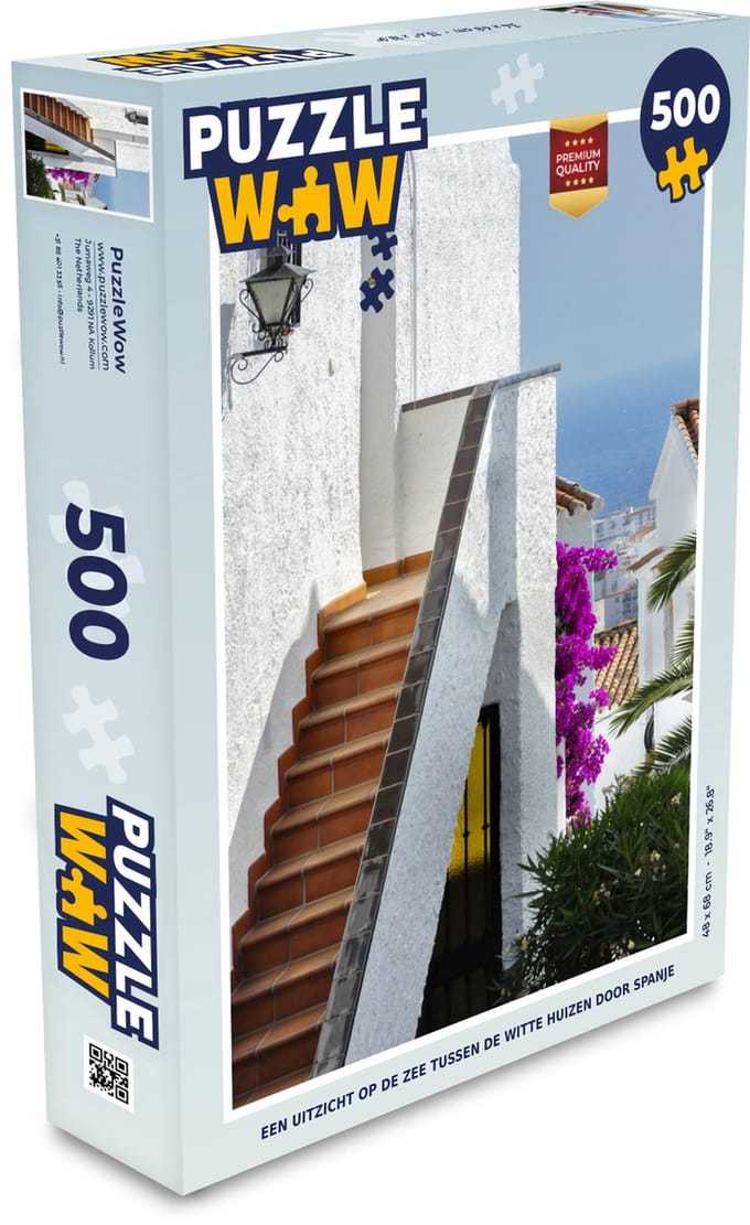 Puzzel Een uitzicht op de zee tussen de witte huizen door Spanje - Legpuzzel - Puzzel 500 stukjes