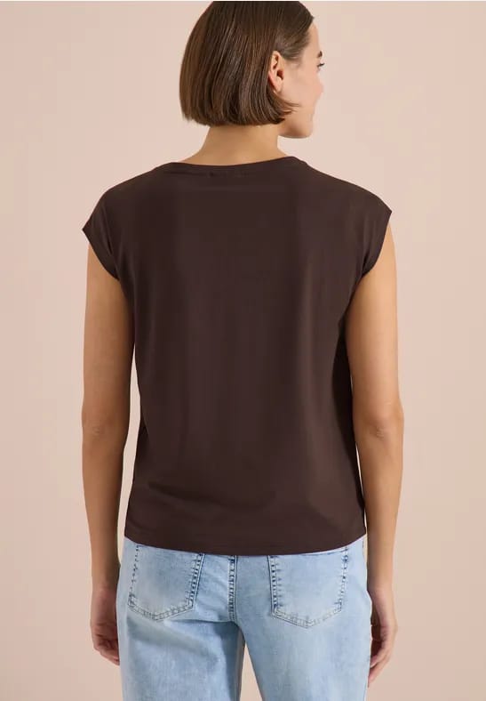 Shirt met overhangende schouder en knoopdetail