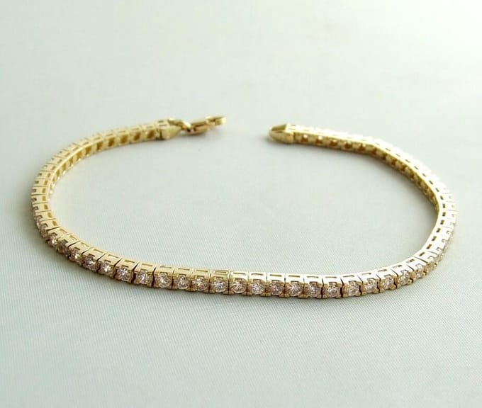 Christian gouden armband met zirkonia