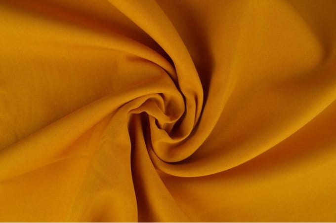 12 meter brandwerende stof - Okergeel - 100% polyester