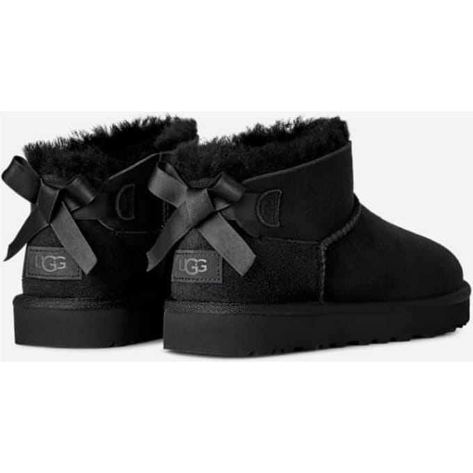 UGG® Ultra Mini Bailey Bow Boot in Black, Size 9, Polyester/Leather