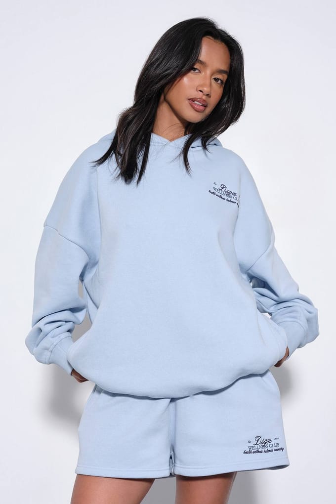 Dames Dsgn Studio Wellness Club Oversized Hoodie Korte Broek Trainingspak | Lichtblauw | Maat: Small