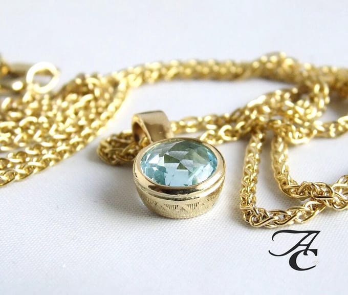 Gouden ketting en zirkonia harten sleutelhanger