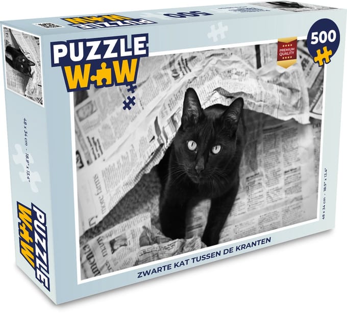 Puzzel Zwarte kat tussen de kranten - Legpuzzel - Puzzel 500 stukjes