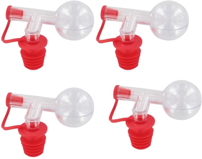 Set van 4 doseerdoppen bolletjes 2,5 cl Fackelmann