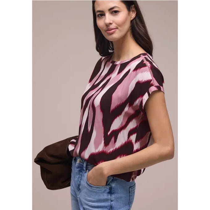 Blouse met overhangende schouders en getapete details