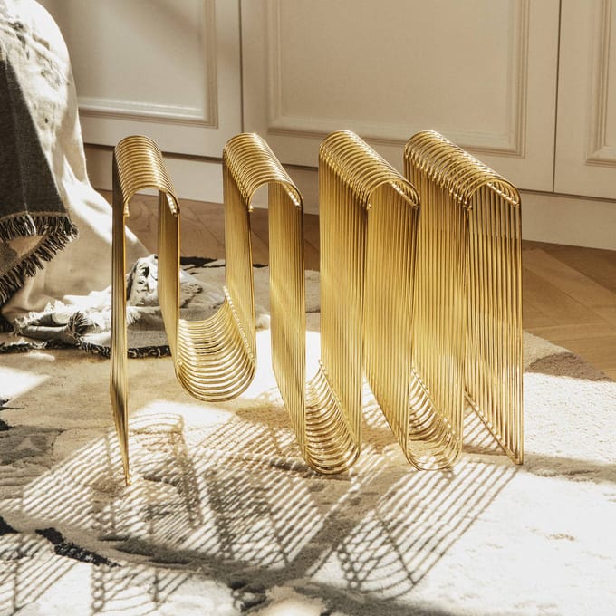 AYTM tijdschriftenhouder Curva, goud, breedte 40 cm, staal