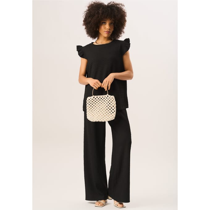 Oversized top met ruches en mouwen