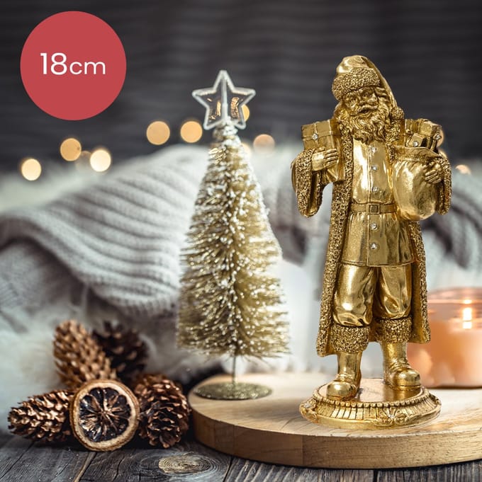 Gouden polyresin kerstman op voetstuk - 18 cm