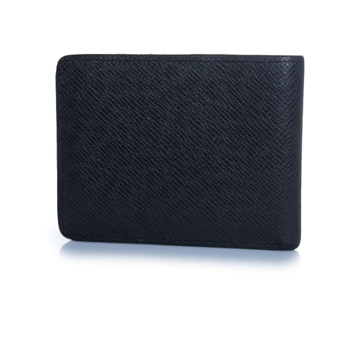 Louis Vuitton portemonnee van zwart generfd leer met LV-logo.