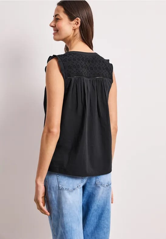Blousetop met gespleten hals en shiffley-details