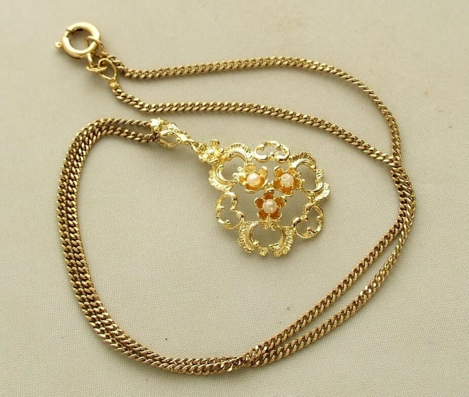 Geel gouden bloem parel collier