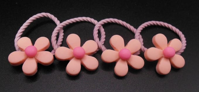 Elastiek met bloem zalmkleur-donkerroze