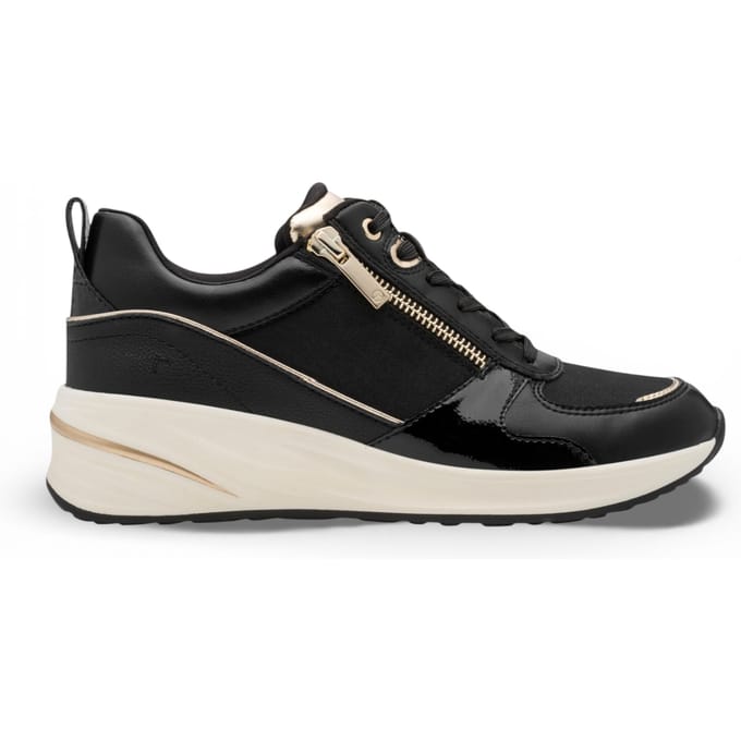 Tamaris dames hardloopschoenen met platformzool, zwart en goudkleurig, met ritssluiting en vetersluiting.
