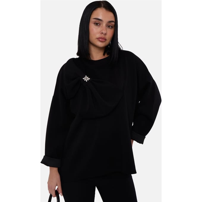 Zwarte oversized trui met contrasterende strik aan de zijkant