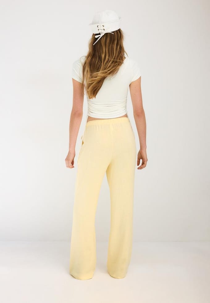 Stradivarius Soepelvallende broek met linnenlook  Pastelgeel M