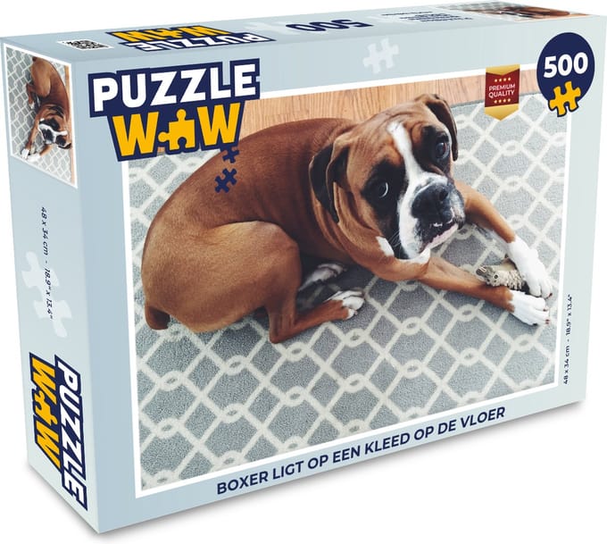 Puzzel Boxer ligt op een kleed op de vloer - Legpuzzel - Puzzel 500 stukjes