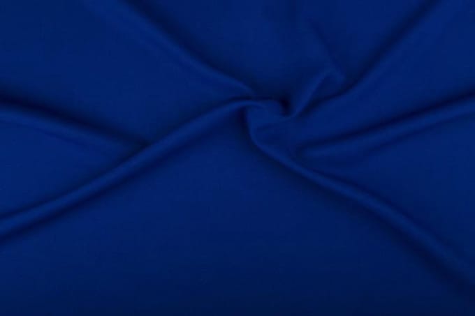 Texture/polyester stof - Blauw - 25 meter