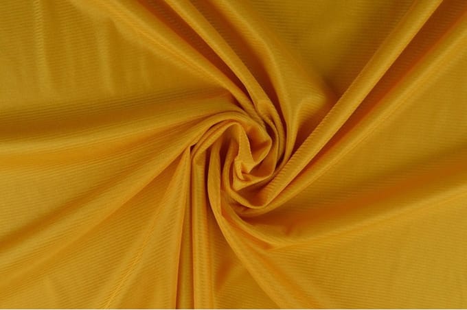 15 meter tricot voering - Okergeel - Stretch voering - 160cm breed