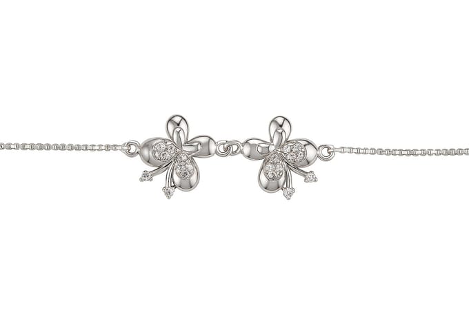 Vlinders armband met steentjes | zilver gekleurd