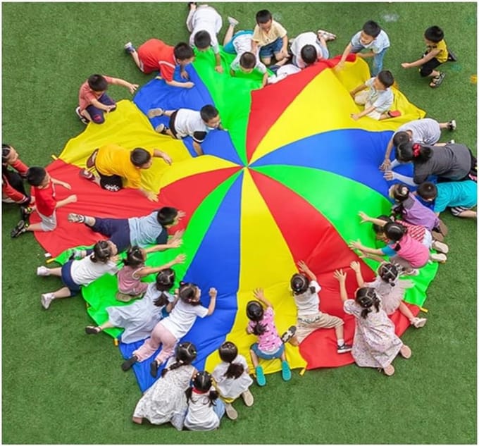 Speel Parachute - Teamwork Spel - Groepsactiviteit Buiten - Regenboog Kleuren - 7 Meter Diameter - Multicolor