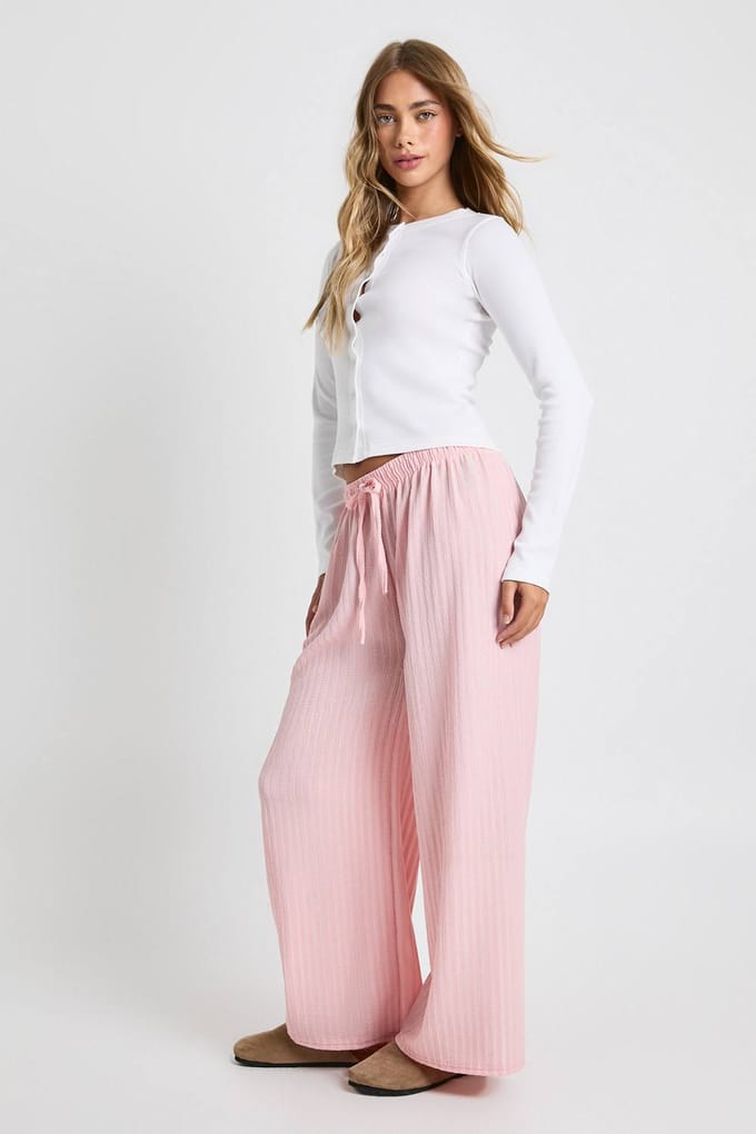boohoo Dames Getextureerde broek met wijde pijpen | Roze | Maat: Small/Medium